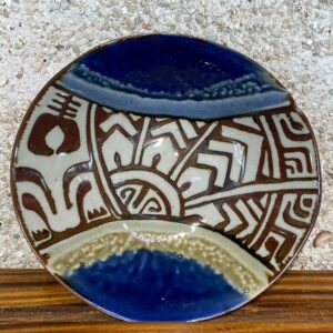 Medium bowl hand decorated with Polynesian tattoo designs glazed in white with green and blue Huahine glazes